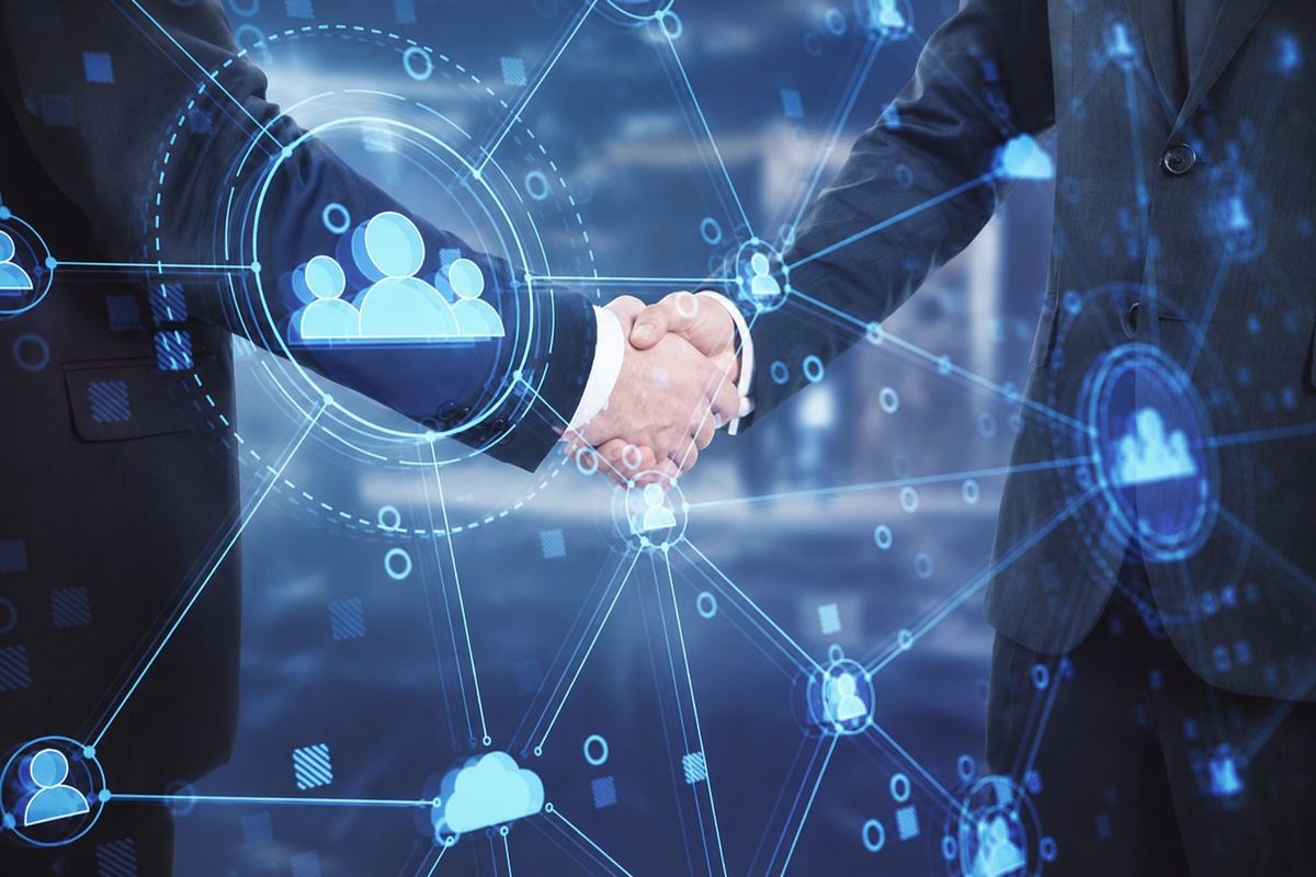 Aperto de mãos entre executivos sobre uma rede de conexões digitais, representando a parceria da Asasul em tecnologia